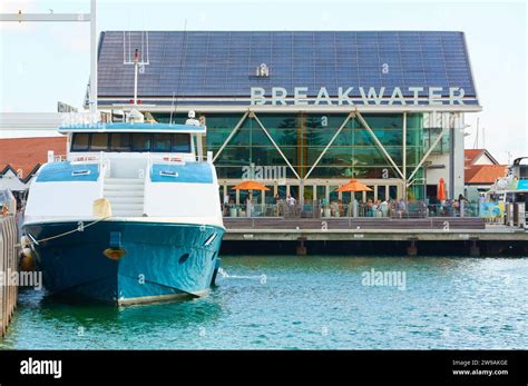 boat docked in front of hermes|Jay.